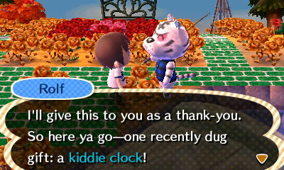 Rolf: I'll give this to you as a thank-you. So here ya go--one recently dug gift: a kiddie clock!
