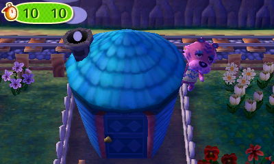 Claudia hides behind Lolly's house in a game of hide-and-seek in Animal Crossing: New Leaf.