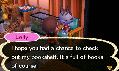Lolly, sitting in a chair: I hope you had a chance to check out my bookshelf. It's full of books, of course!