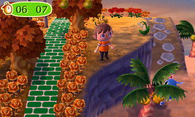 Hornsby peeks out from behind a banana tree on the beach during a game of hide-and-seek in Animal Crossing: New Leaf.