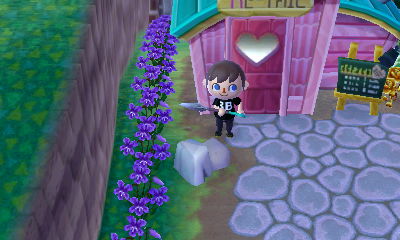 A fake rock right outside of Re-Tail's door.