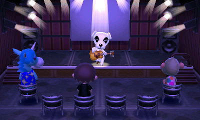 K.K. Slider performs as Julian, Jeff, and Elise look on.