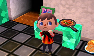 Showing off my new frying pan, a reward for playing Desert Island Escape.