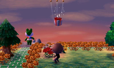 A balloon present falls to the ground after its balloon is popped.