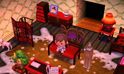 The chic wall and cowhide rug on display in my house.