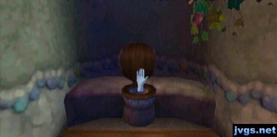 A hand coming out of the toilet!