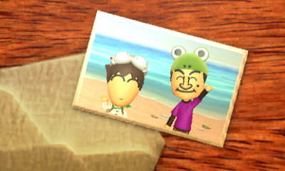 Mr. Bean and Baggette wave hello from the beach.