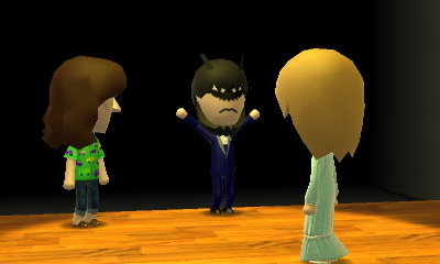 Batman magically appears in the concert hall.