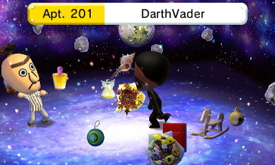 Bert and Darth Vader having a fight by throwing items at each other.