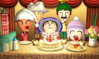 Jeff blows out his birthday candles.