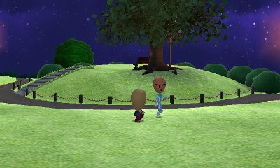 Miss Piggy and Alien take a night walk in the park.