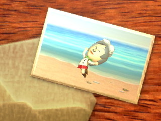 Zoey jumps for joy on the beach.